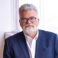 headshot of Jim Armour