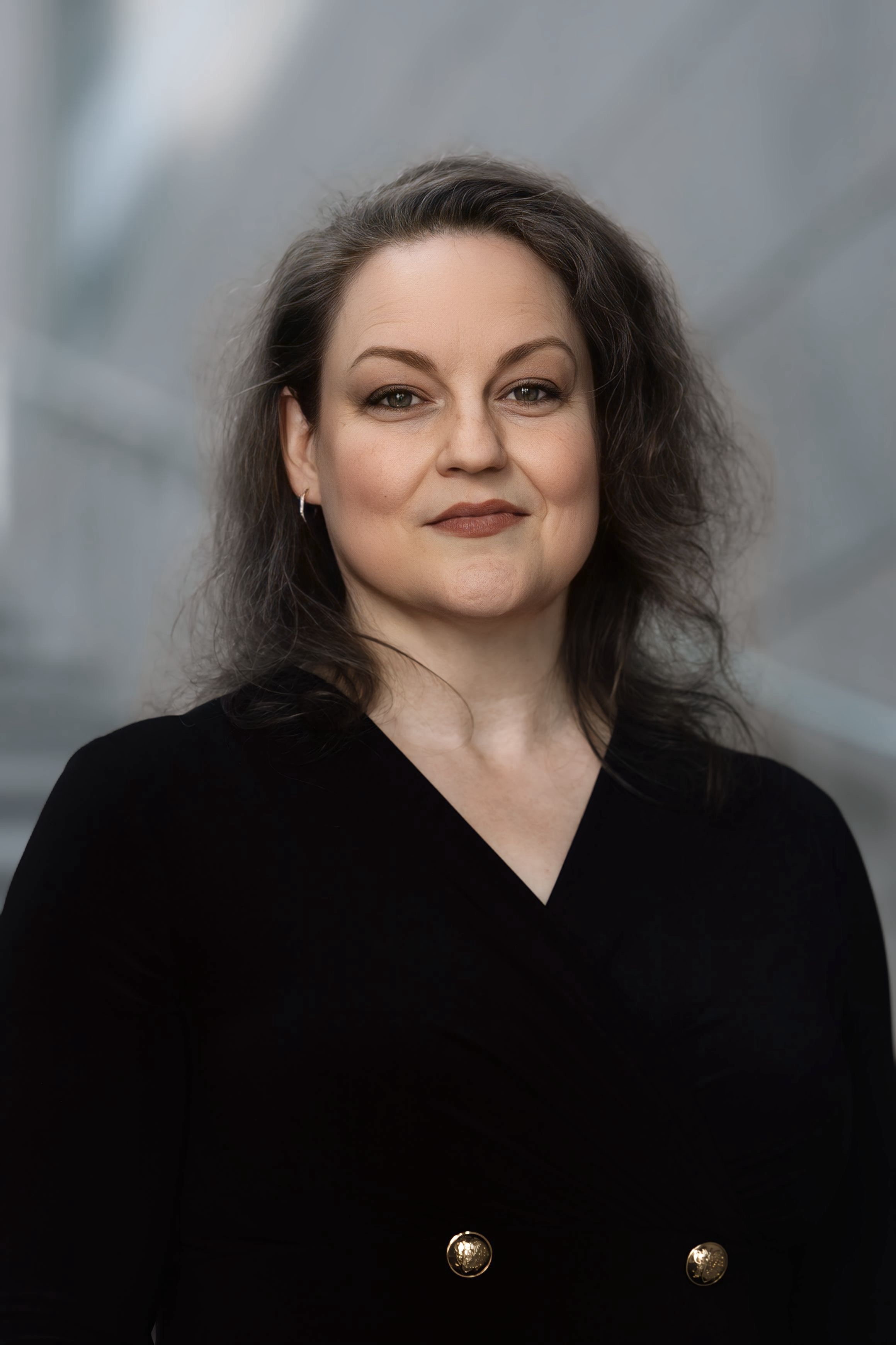 woman poses for headshot
